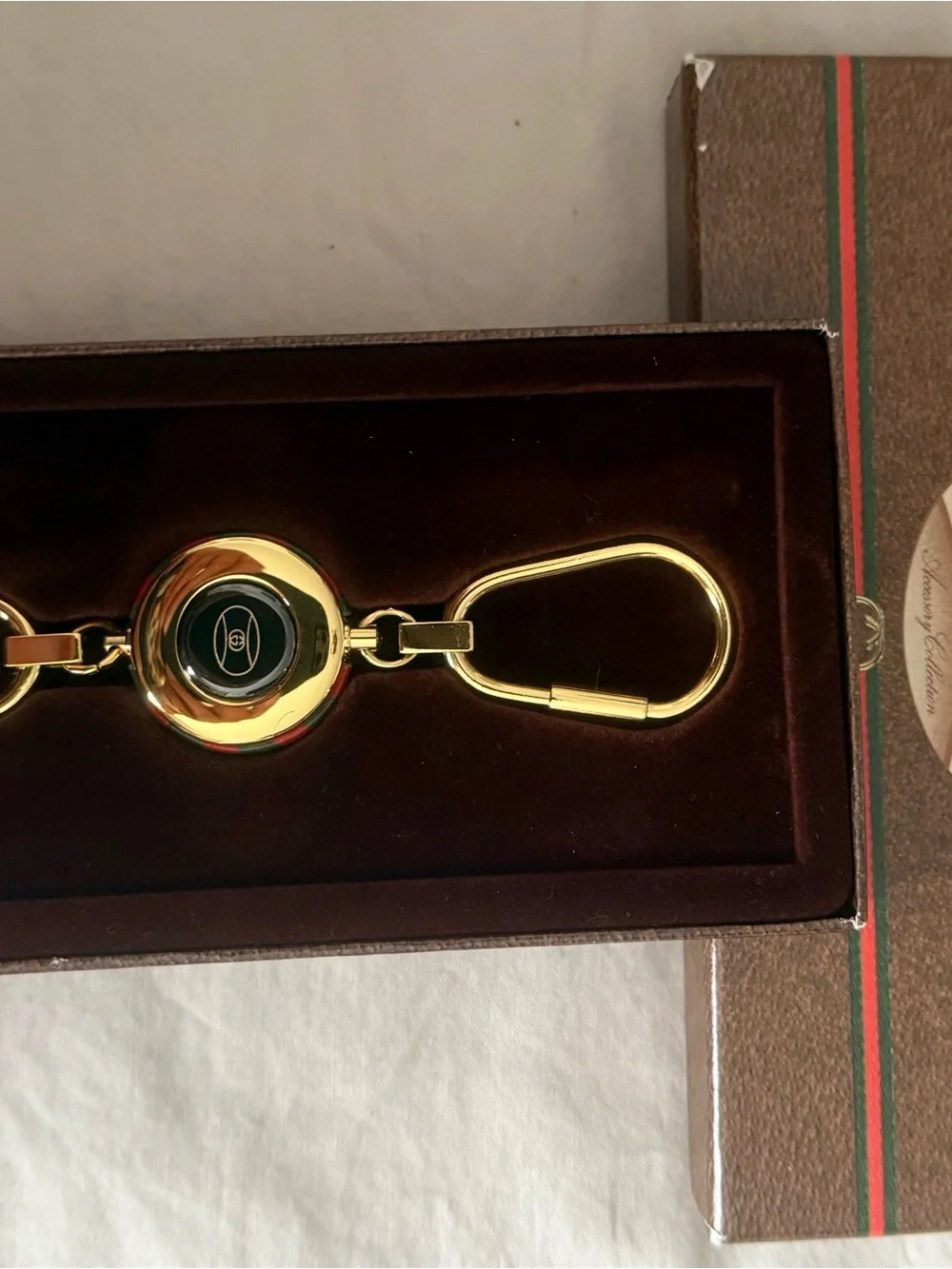 Gucci Gold Double Clip Key Holder with Black Center Accent